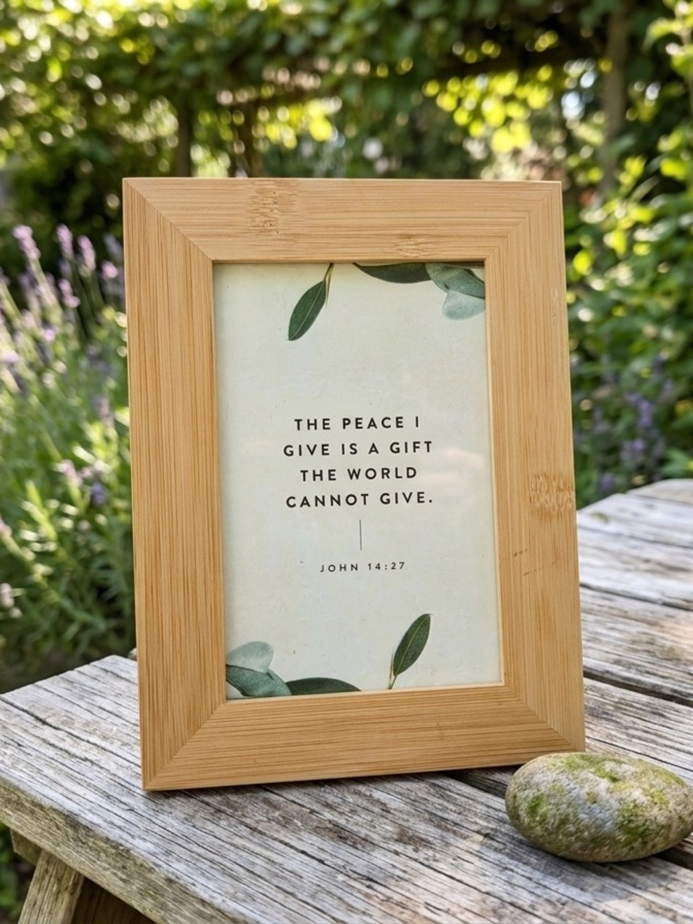 Bamboo tabletop picture frame containing a minimalist Christian scripture print